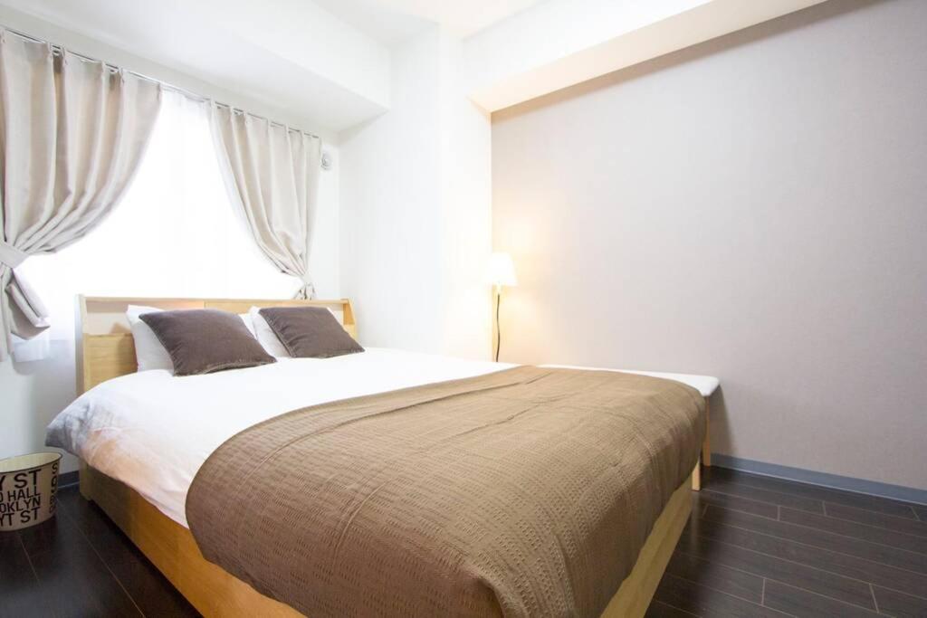 ようこそ札幌へ! 大通公園まで地下鉄10分 定員6名 Firetv完備 1階はセコマ Apartment Luaran gambar