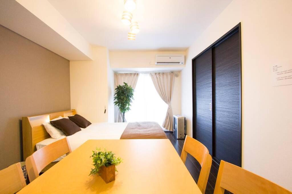 ようこそ札幌へ! 大通公園まで地下鉄10分 定員6名 Firetv完備 1階はセコマ Apartment Luaran gambar
